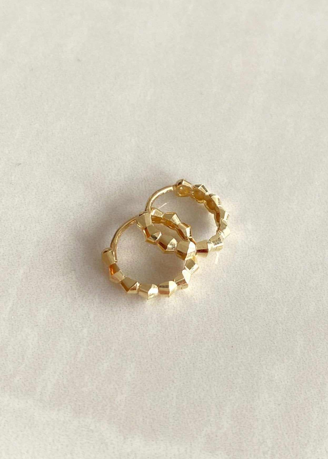 Diamond Cut Huggies (10k Solid Gold)
